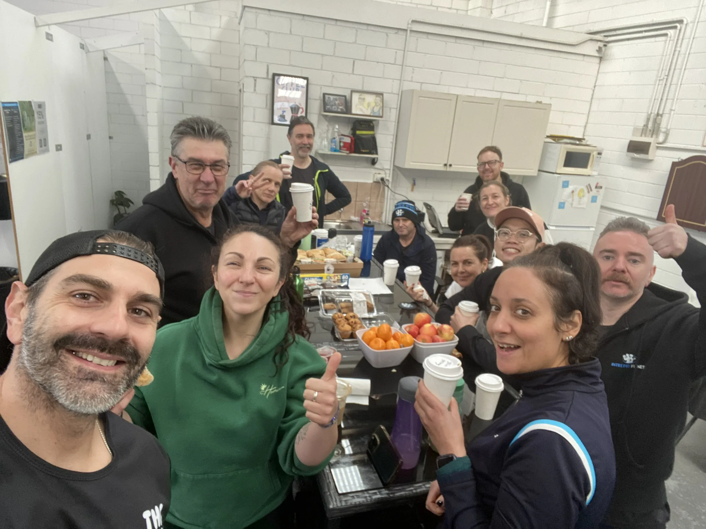 group having breakfast, coffee and fruit